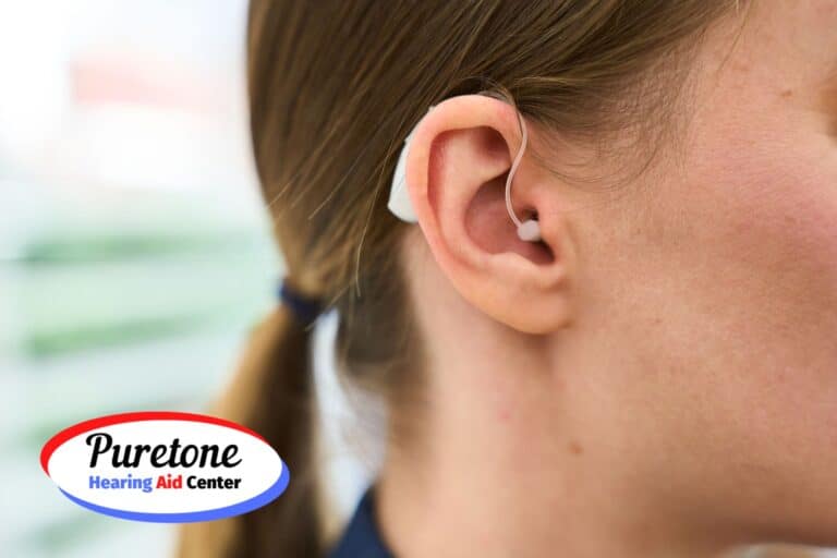 woman with hearing aid in her ear