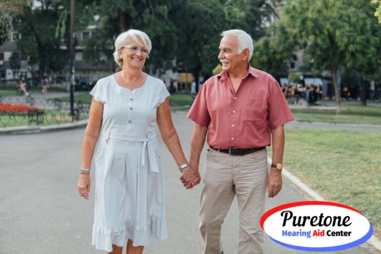 older couple holding hands